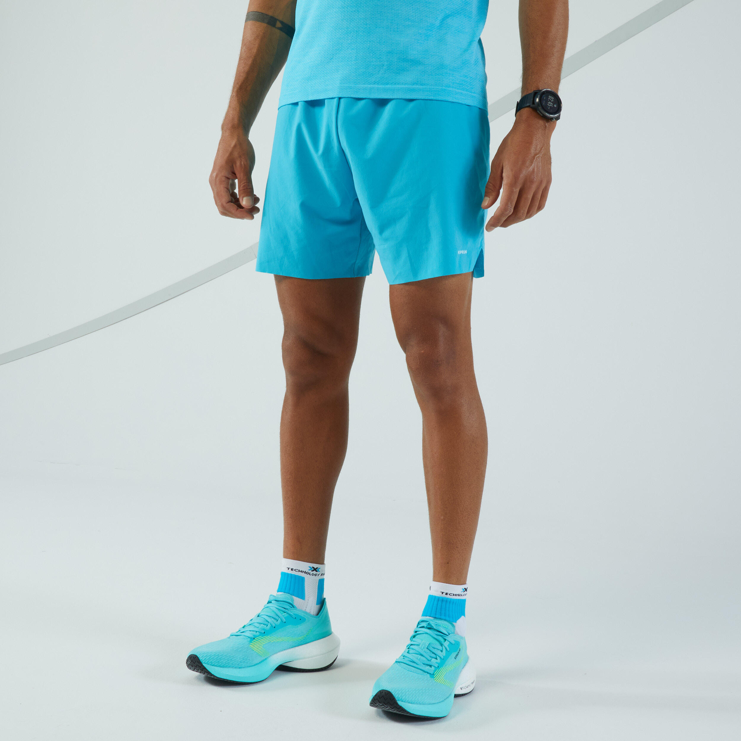pantaloncini-running-uomo-kiprun-light-turchesi-1.jpg